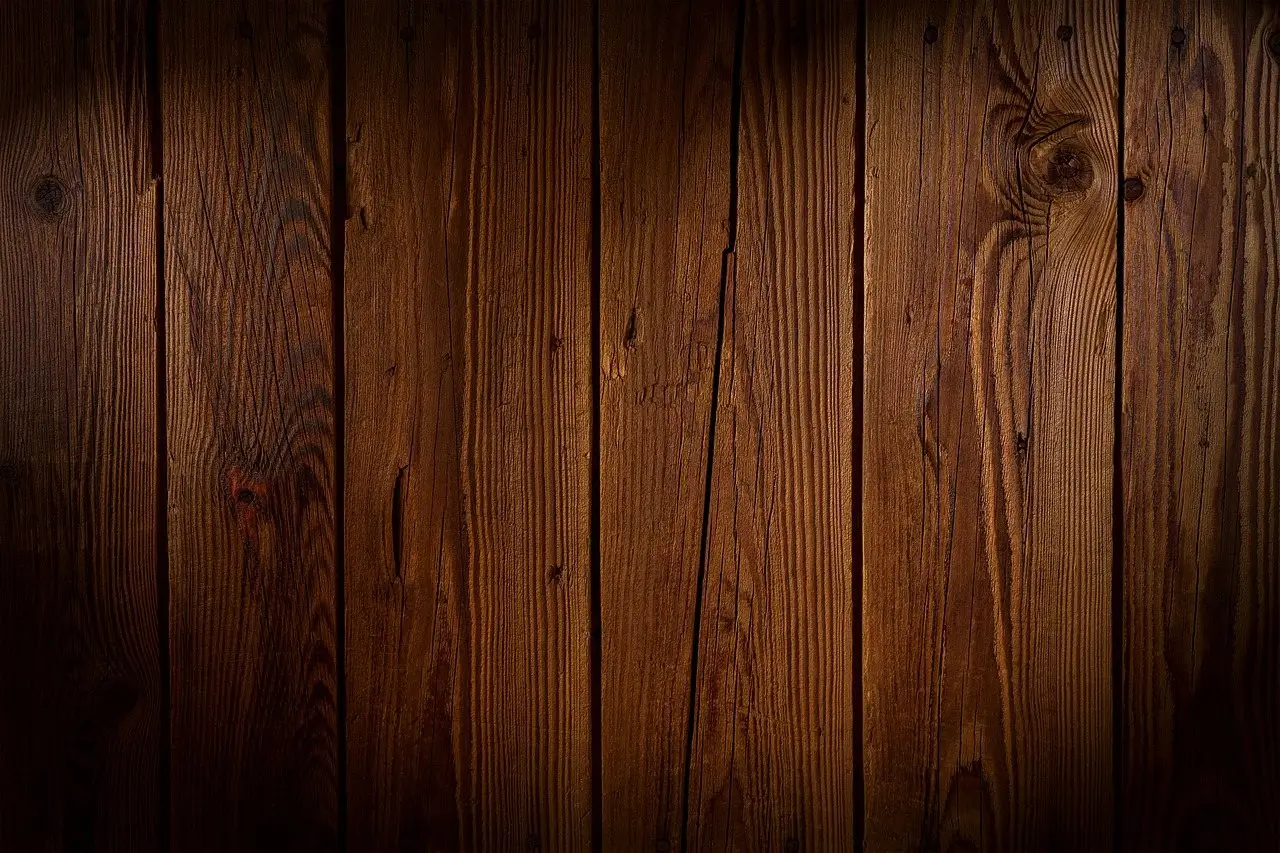 Close grain detail across the surface of sawn softwood boards